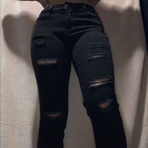 Black tight jeans with rips